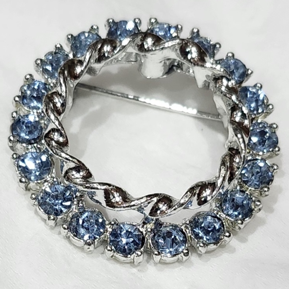 Vintage Silver Wreath Brooch With Blue Stones By Gerry